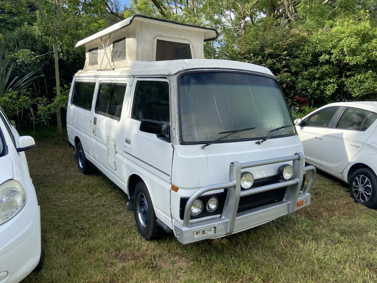 Nissan Urvan E23 in my Garden.jpg.jpeg Nissan Urvan E23 in my Garden after I had bought and brough her home
